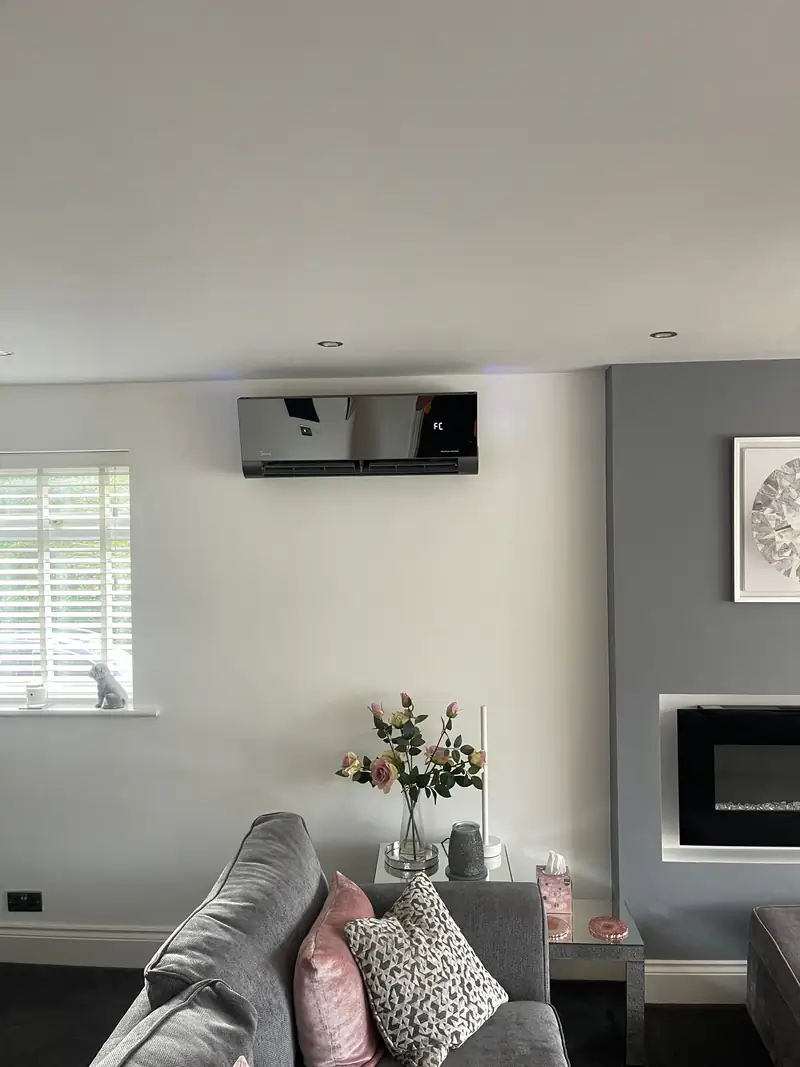 Air conditioning in Copmanthorpe, York Black-finish wall-mounted air conditioning unit in a bright living room in a Copmanthorpe family home