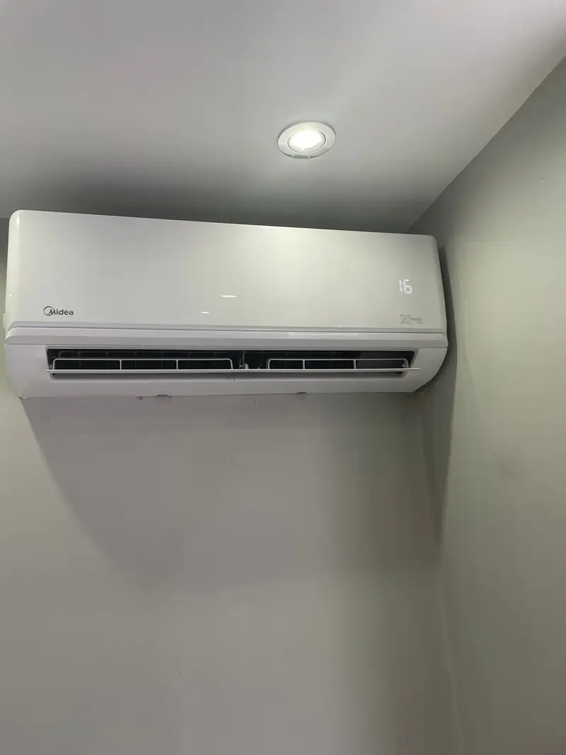 Air conditioning servicing in York Clean white wall-mounted air conditioning indoor unit after a service in York